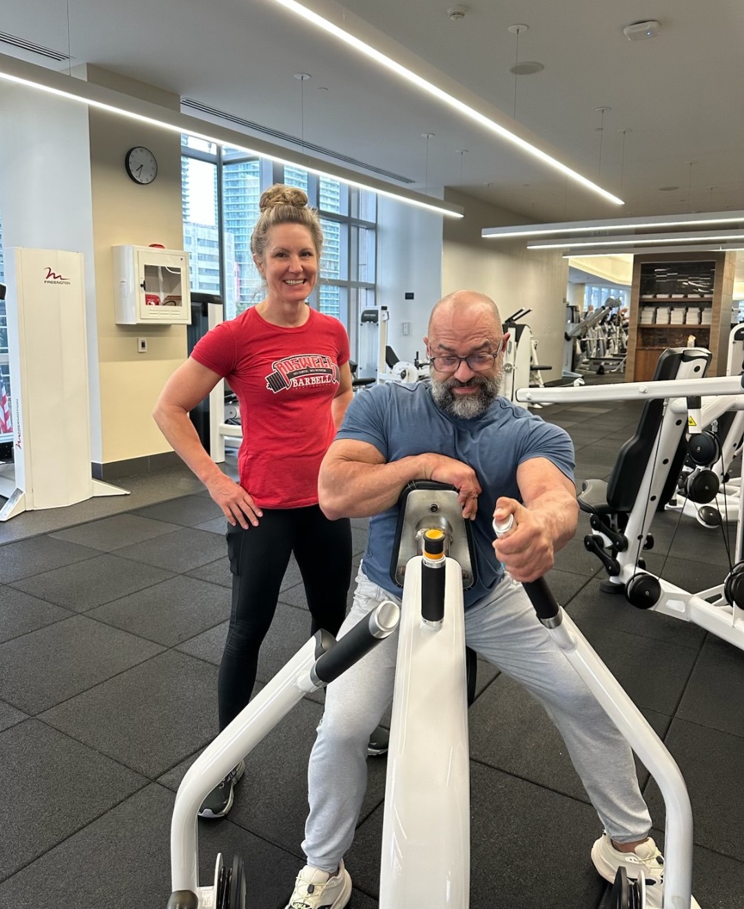 Anthony Castore coaching a client through a strength session at DRIVE Longevity Solutions.